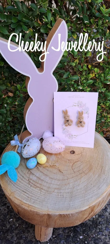 Cute flocked bunny earrings.
Stainless studded back earring, all so cute.