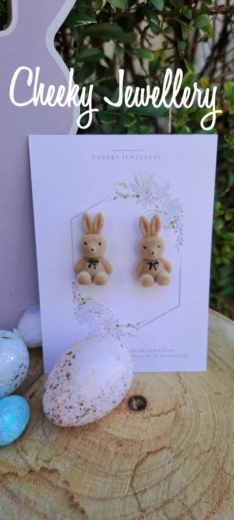 Cute flocked bunny earrings.
Stainless studded back earring, all so cute.