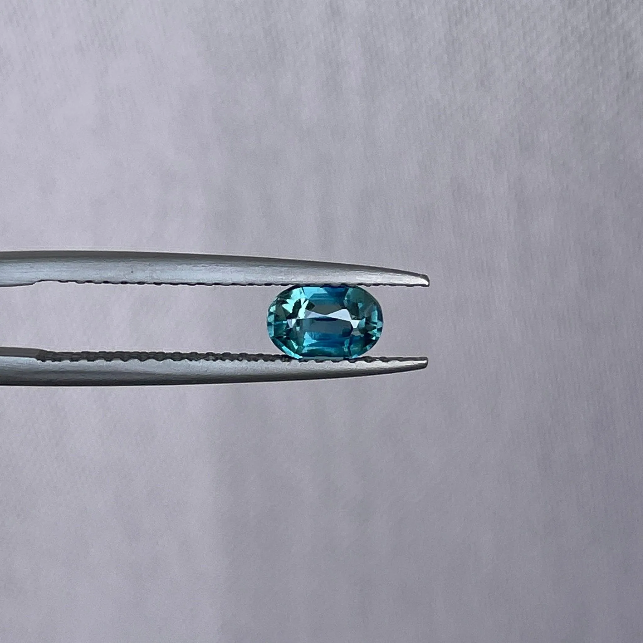 Loose sapphire heated certified blue green oval shape cut natural 0.73 ct