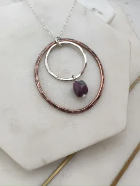 Sterling silver and copper forged hoop necklace with ruby zosite